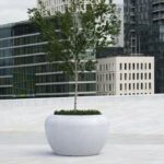 Colección de jardineras urbanas de hormigón Planets blanca